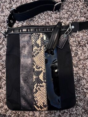Coach Crossbody with Black Cloth with Snake, Patent and Shimmer accents.